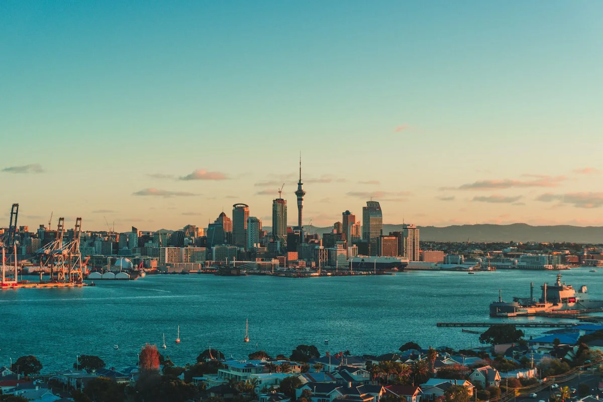 Auckland across the harbour in warm evening light